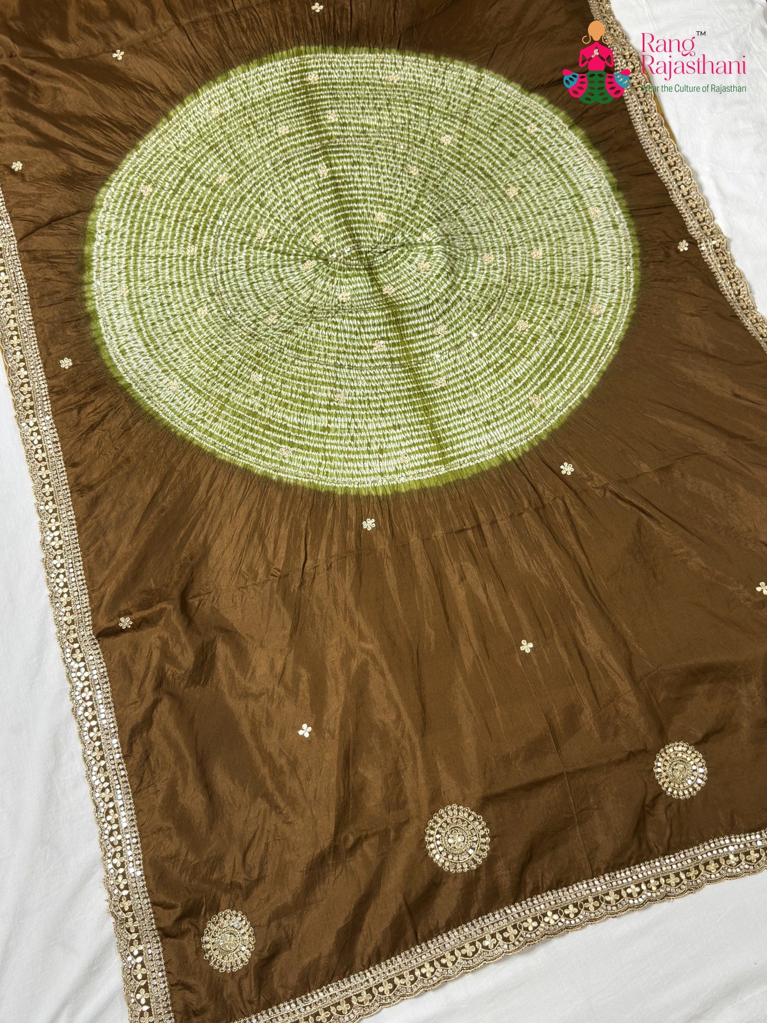 close up view of brown pure ho silk hand embellishment saree