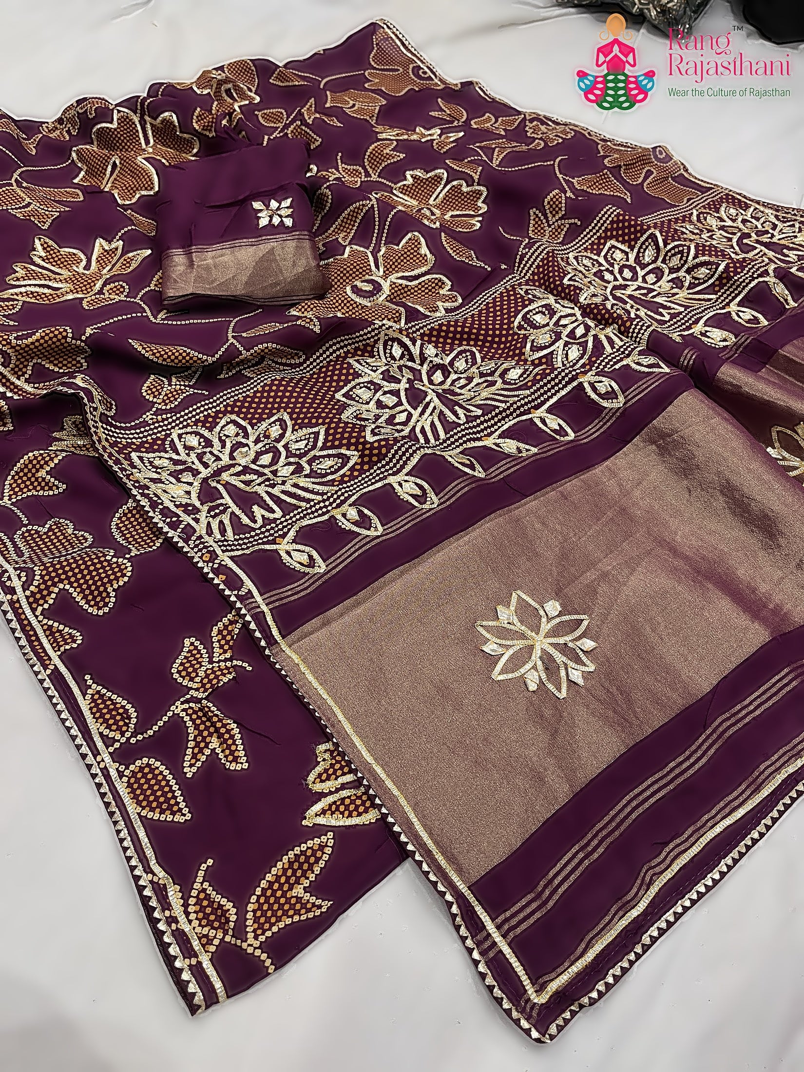 fabric texture of burgundy pure Russian silk bandhani saree 