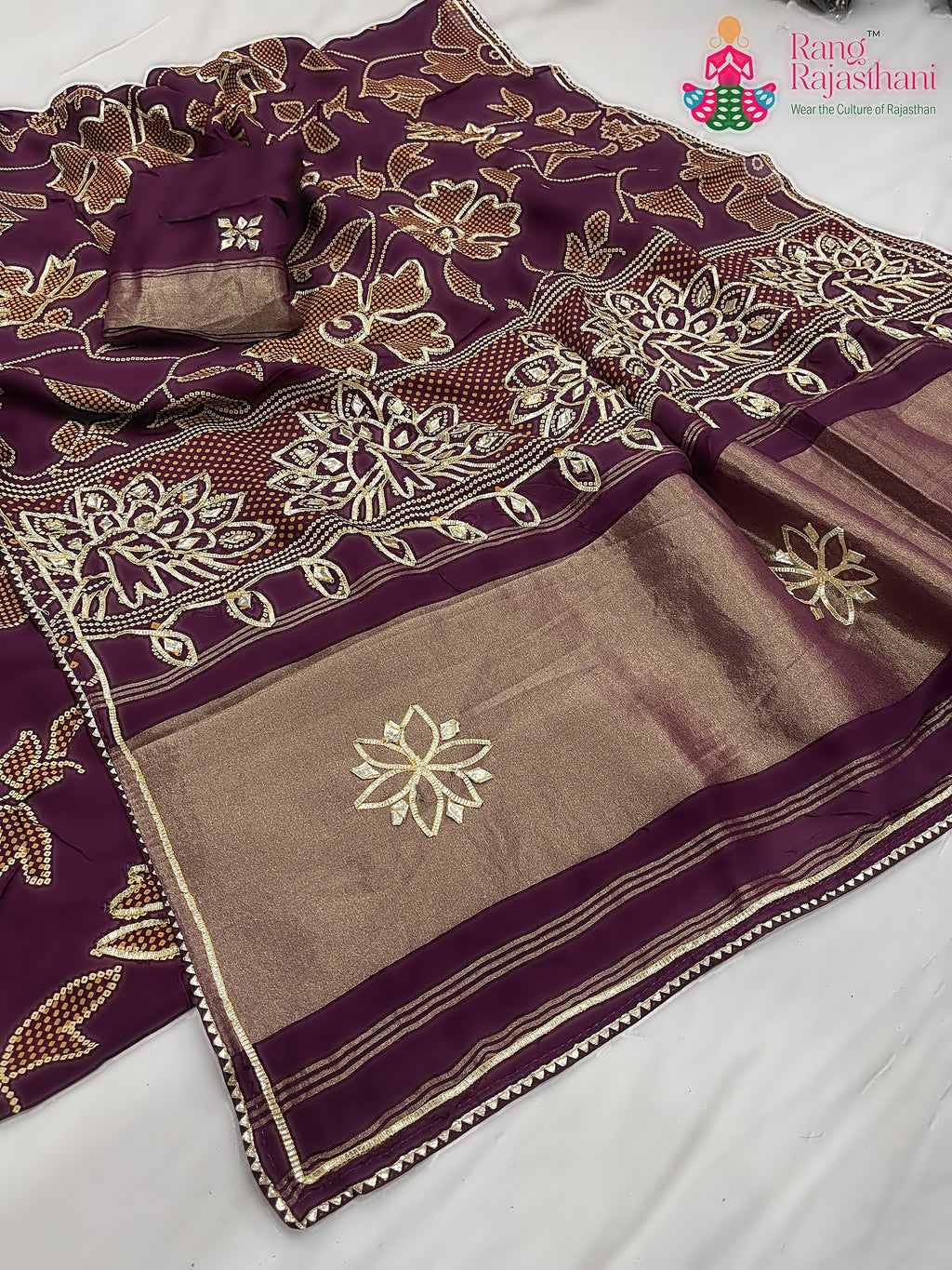 border detailing of burgundy pure Russian silk bandhani saree 