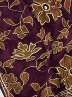 close up view of burgundy pure russsian silk bandhani saree