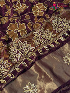 pallu detailing of burgundy pure russsian silk bandhani saree