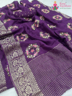 close up detailing of burgundy pure Russian silk resham embroidery saree 