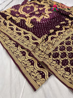 close up detailing of burgundy saree 