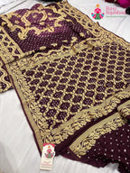 pallu detailing of burgundy saree 