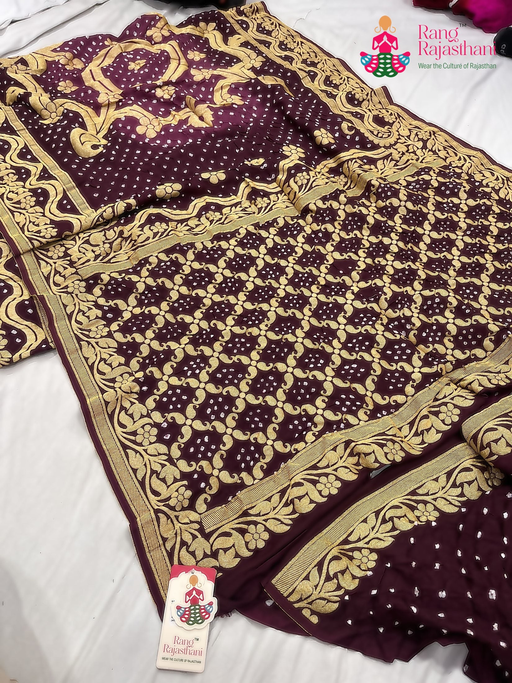 pallu detailing of burgundy saree 