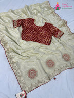 border detailing of chiku fabric saree