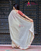 Beige Pure Tissue Silk saree with Boutique Handwork back view
