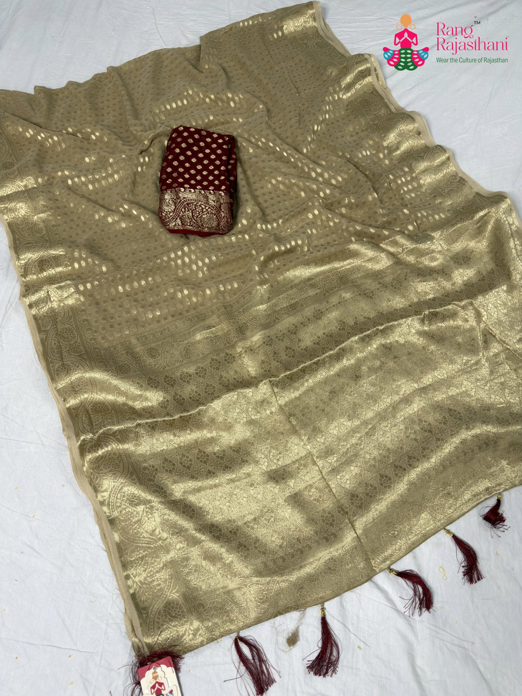border detailing of chiku pure georgette khaddi saree