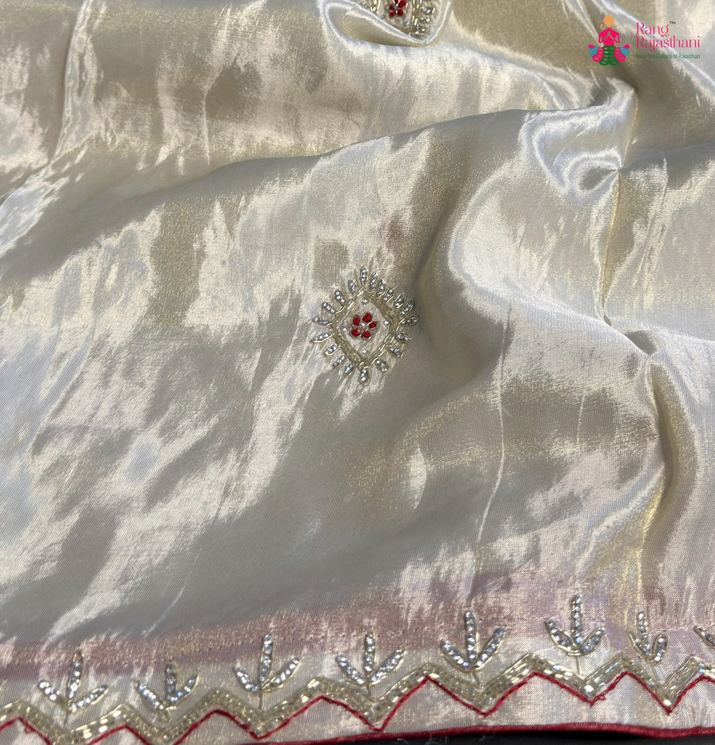 border detailing of cream pure tissue silk gota patti saree