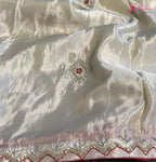 border detailing of cream pure tissue silk gota patti saree