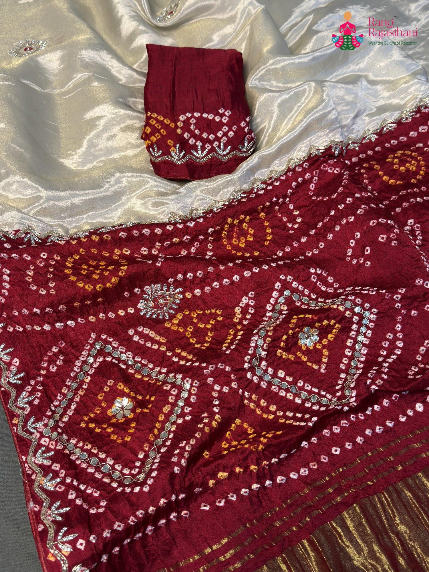 fabric texture of cream pure tissue silk gota patti saree