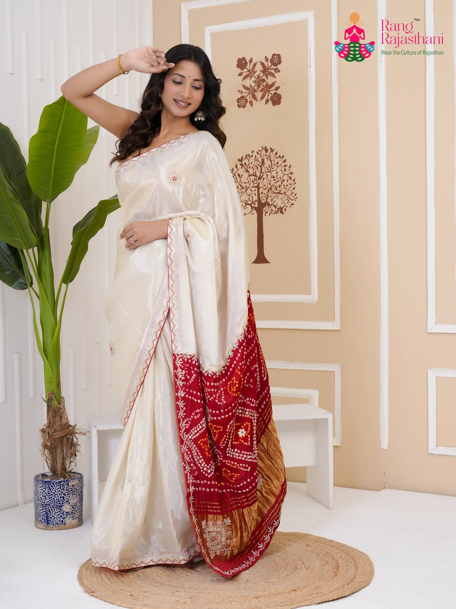 pallu detailing of cream pure tissue silk gota patti saree