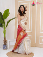 border detail of cream pure tissue silk gota patti saree