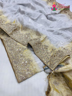 pallu detailing of cream pure tissue silk zari embroidery saree