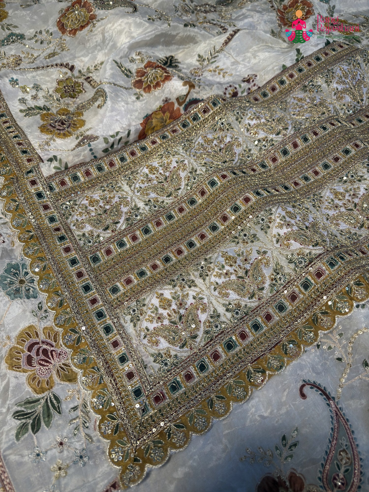 fabric texture of cream pure tissue silk zari embroidery saree