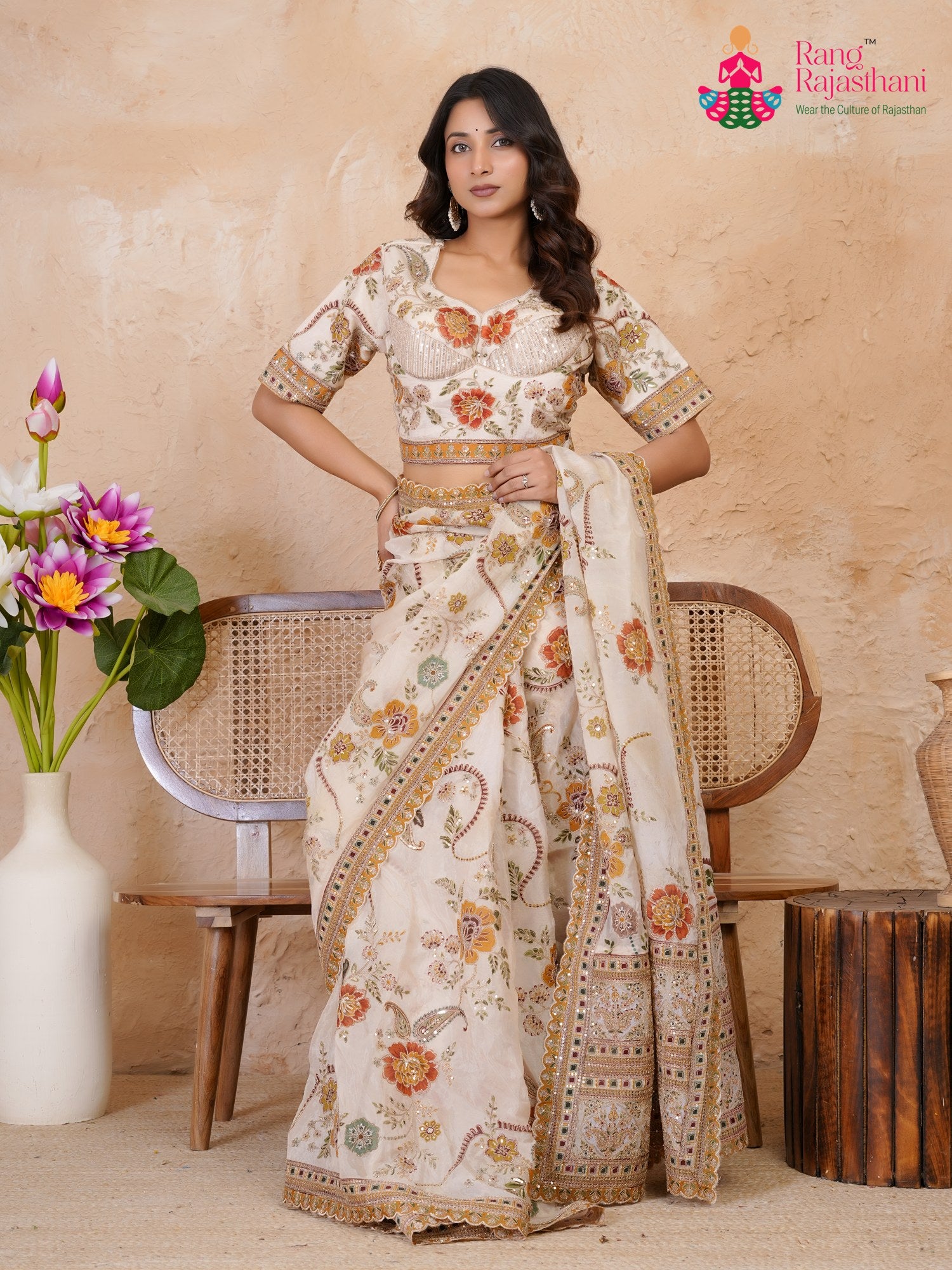 pallu detailing of cream pure tissue silk zari embroidery saree
