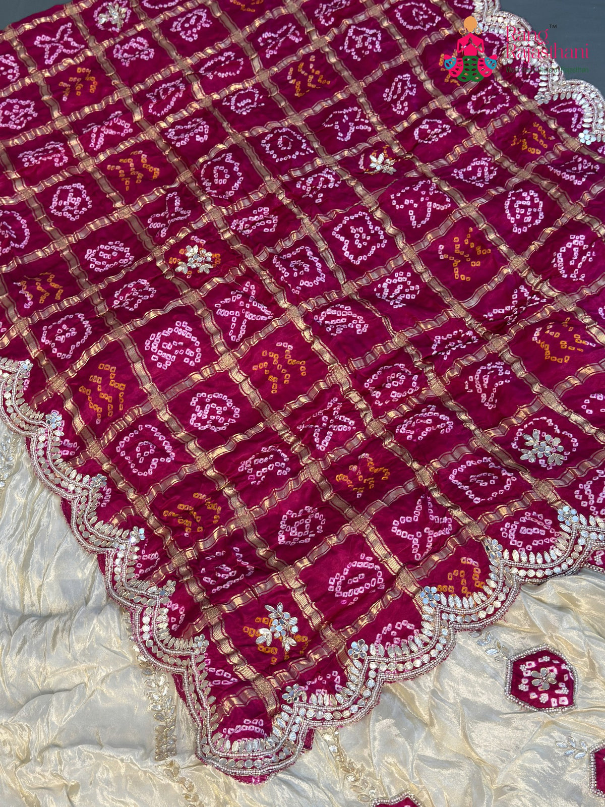 chunni detail of cream semi gaji silk bandhani lehenga chunni