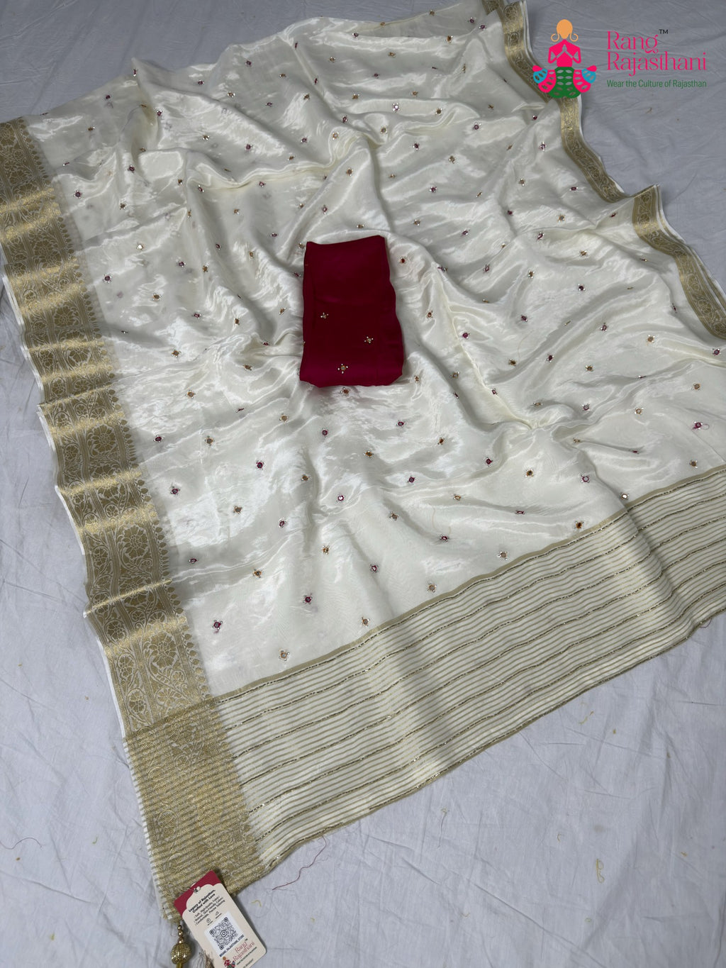 border detailing of cream pure ho silk mirror saree