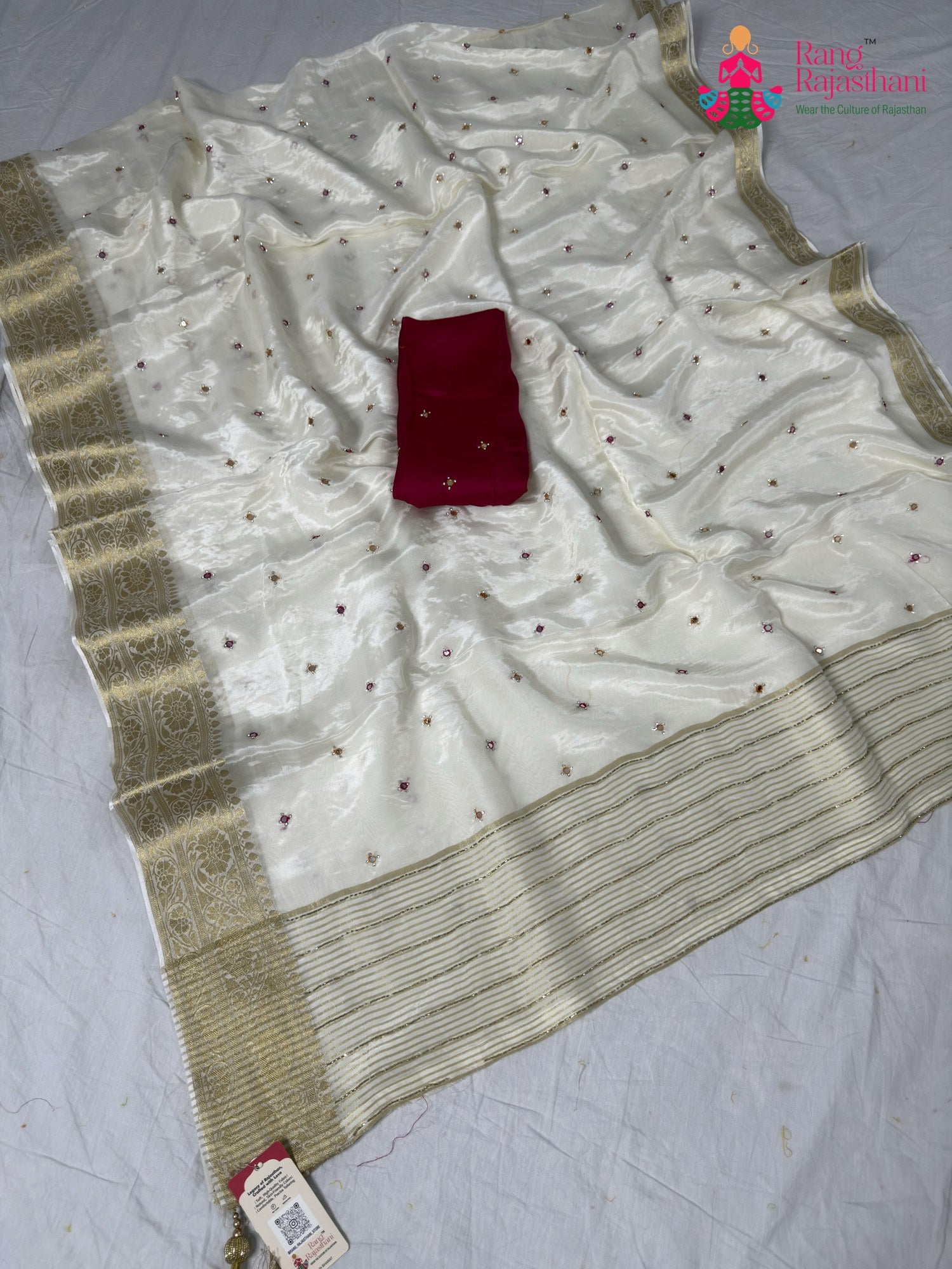 border detailing of cream pure ho silk mirror saree