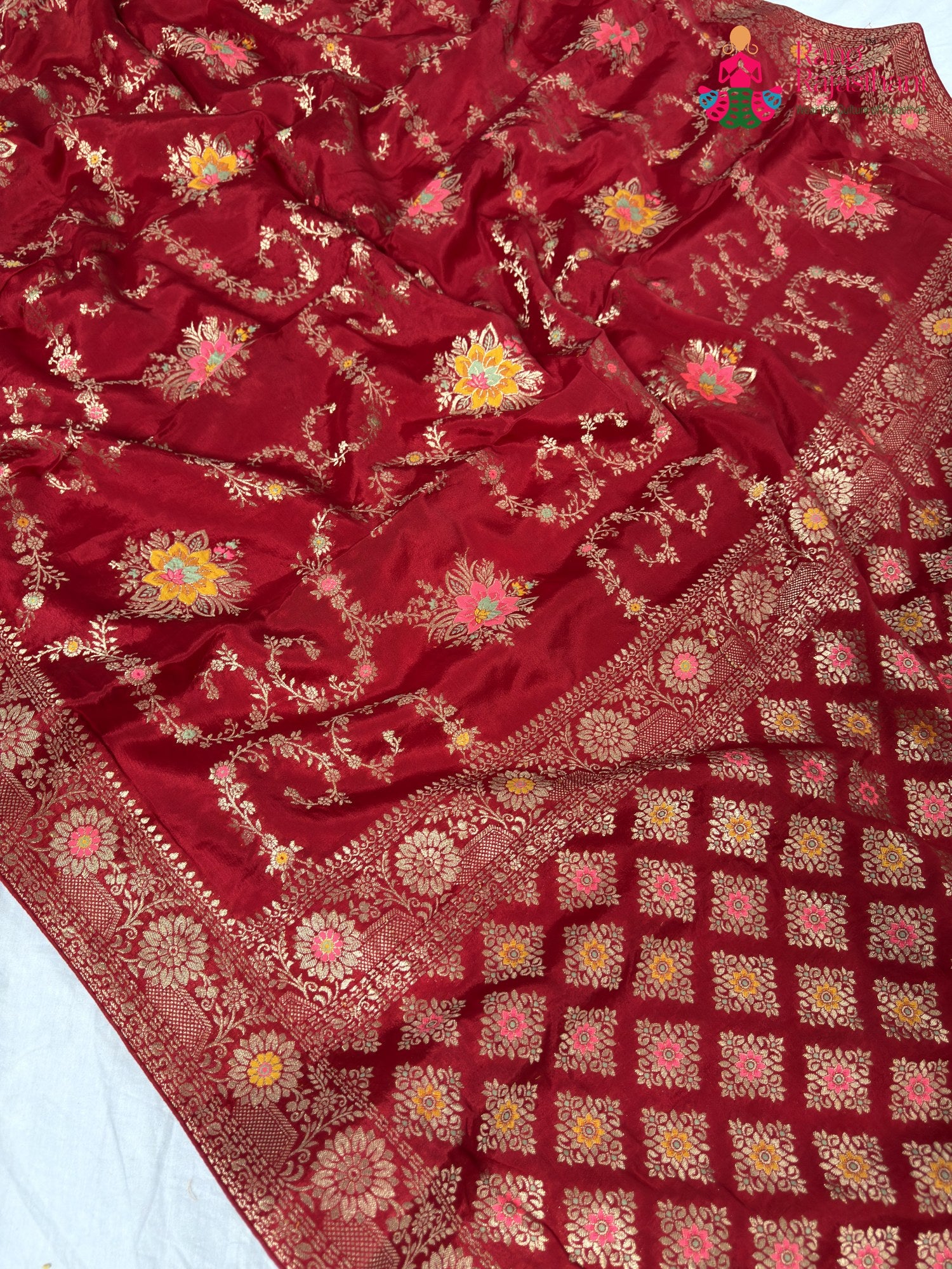 fabric texture of crimson red pure crape chinon banarasi khaddi mina jaal saree