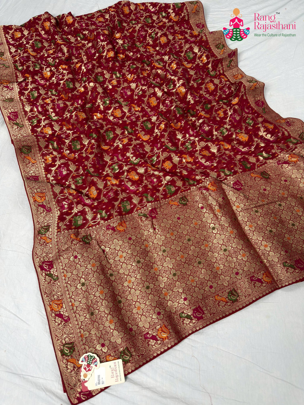 border detailing of crimson red pure georgette khaddi saree