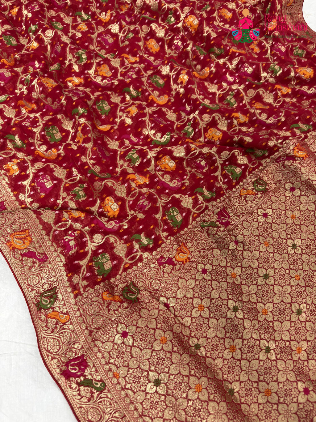 fabric texture of crimson red pure georgette khaddi saree