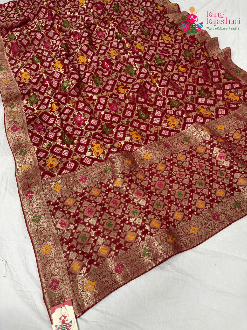 border detailing of crimson red pure georgette khaddi saree