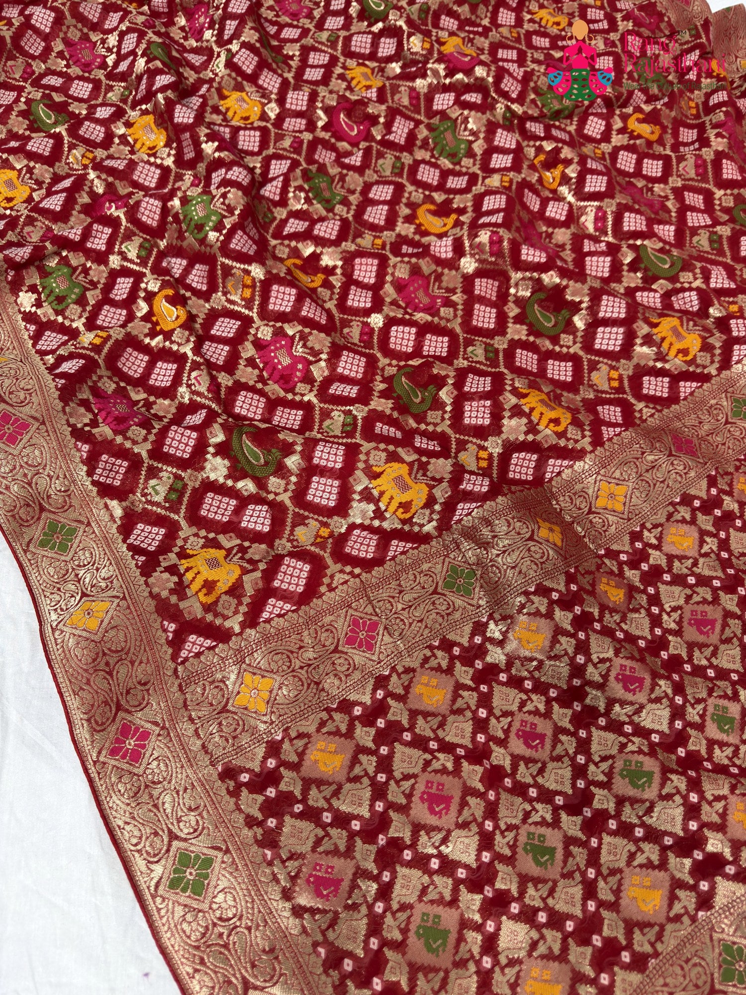 fabric texture of crimson red pure georgette khaddi saree