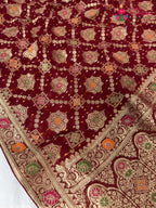 border detailing of crimson red pure georgette khaddi saree