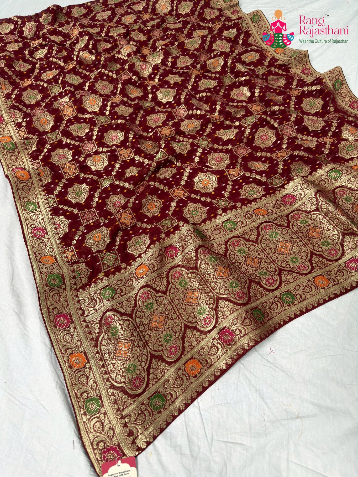 fabric texture of crimson red pure georgette khaddi saree