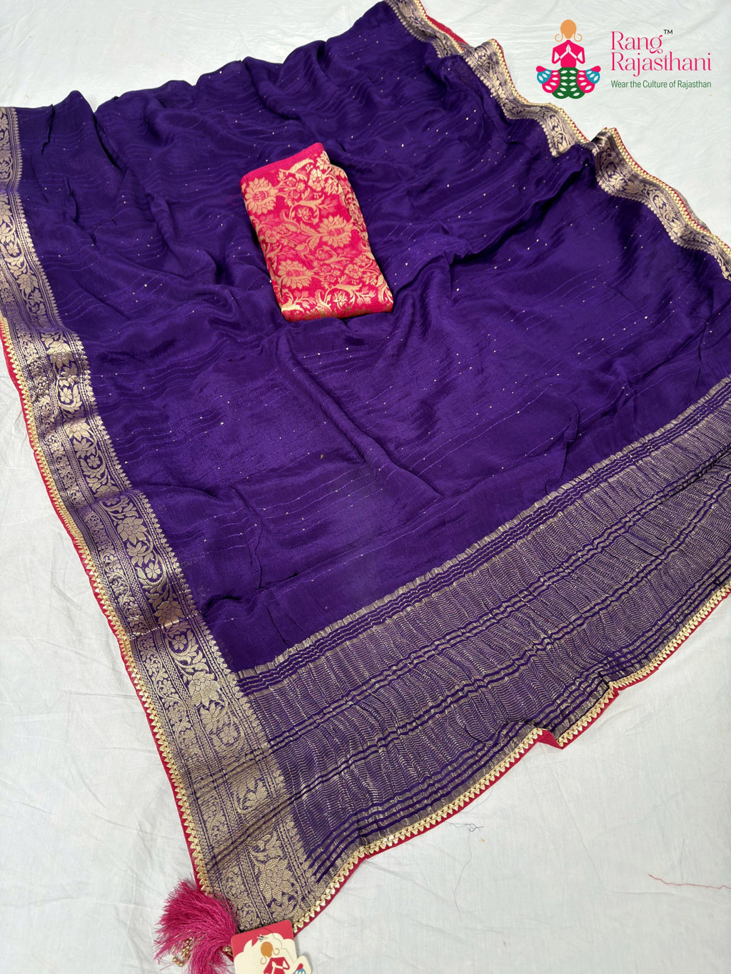 border detailing of purple fabric saree