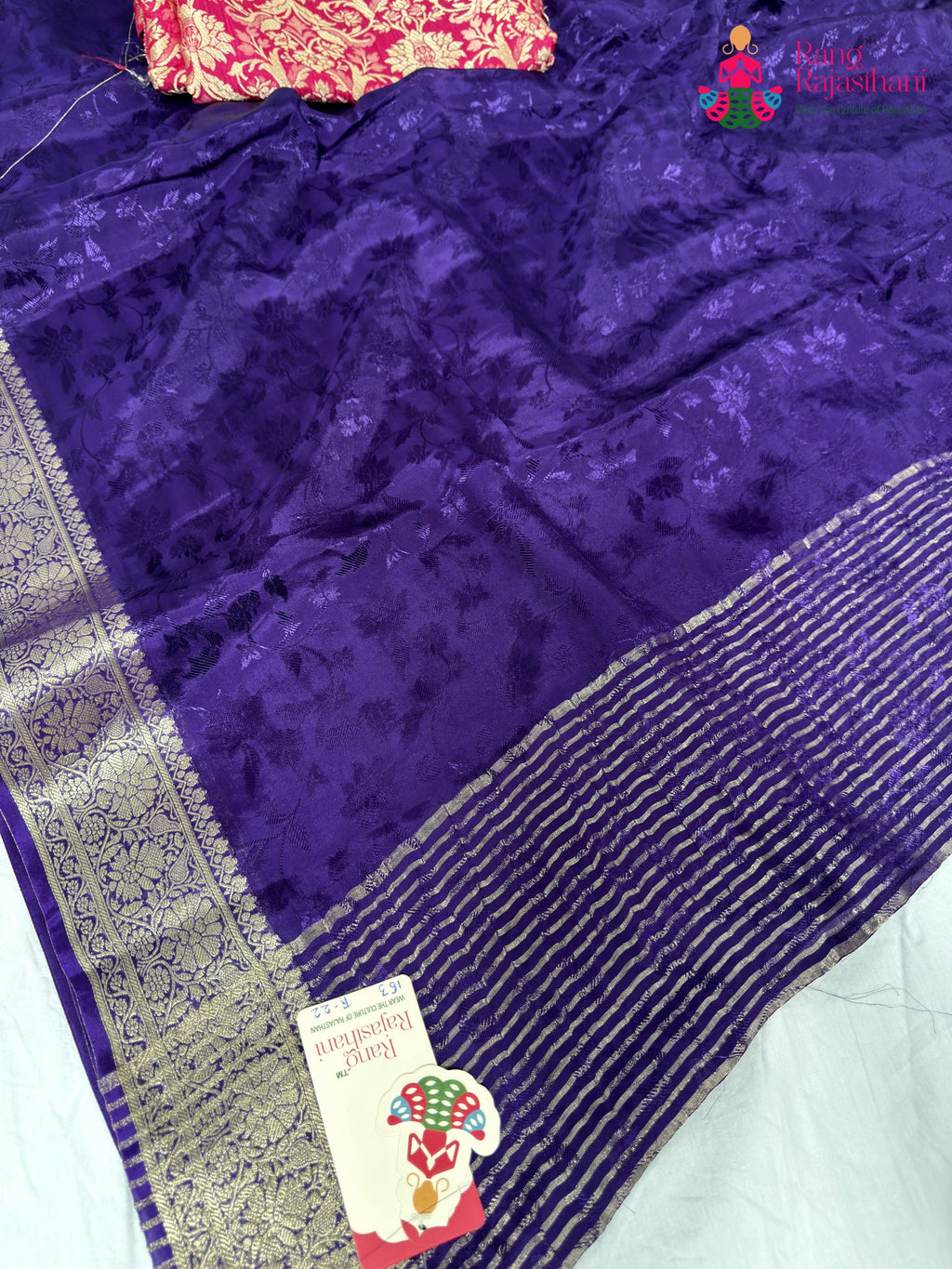 fabric texture of purple print fabric saree
