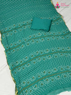 pallu detailing of firozi chiffon saree