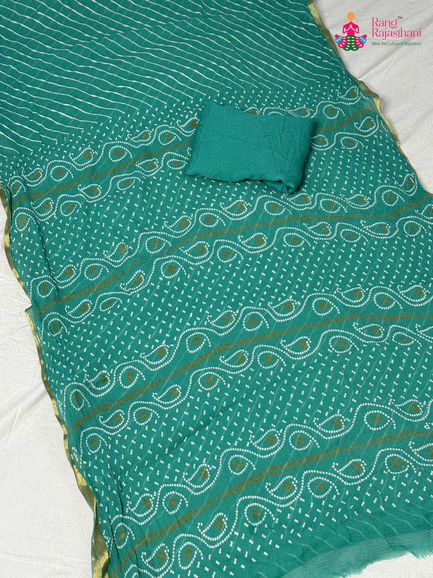 pallu detailing of firozi chiffon saree