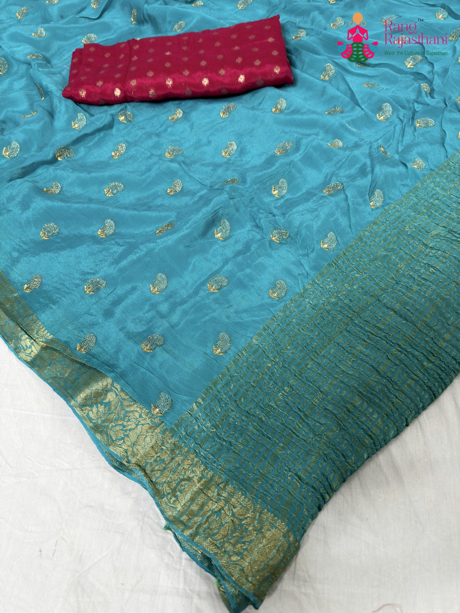 pallu detailing of firozi chinnon resham embroidery saree