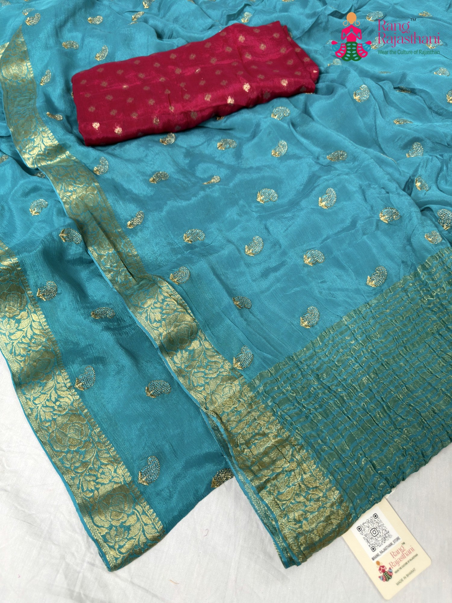 border detailing of firozi chinnon resham embroidery saree