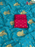 pallu detailing of firozi chinnon sequin saree