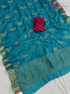 pallu detailing of firozi chinnon zari embroidery saree