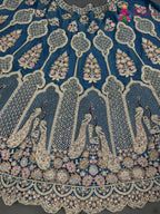 chunni detail of firozi net zari embroidery saree