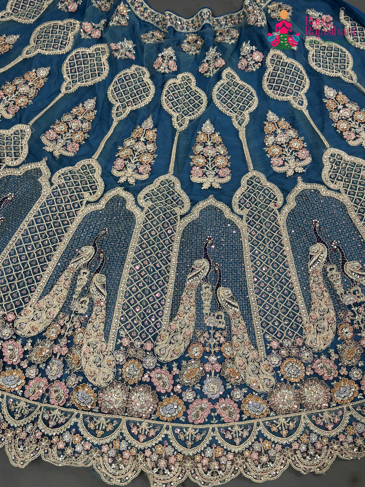 chunni detail of firozi net zari embroidery saree