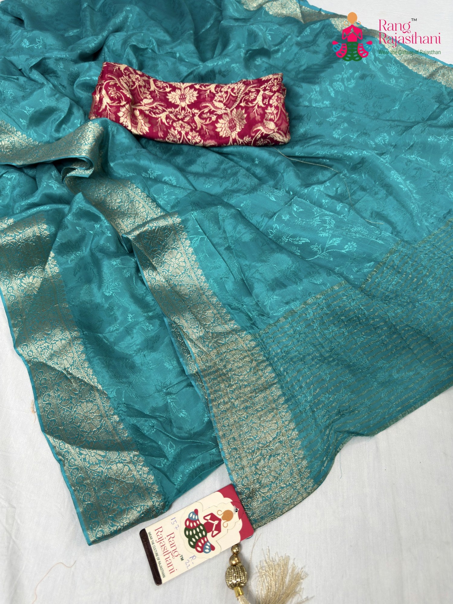 close up detailing of firozi pure ho silk jacquard weave saree