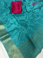 fabric texture of firozi pure ho silk mirror saree