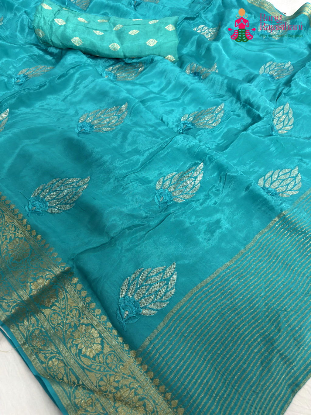 close up detailing of firozi pure ho silk sequin saree