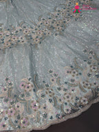 lehenga flare detailing of firozi synthetic sequin saree
