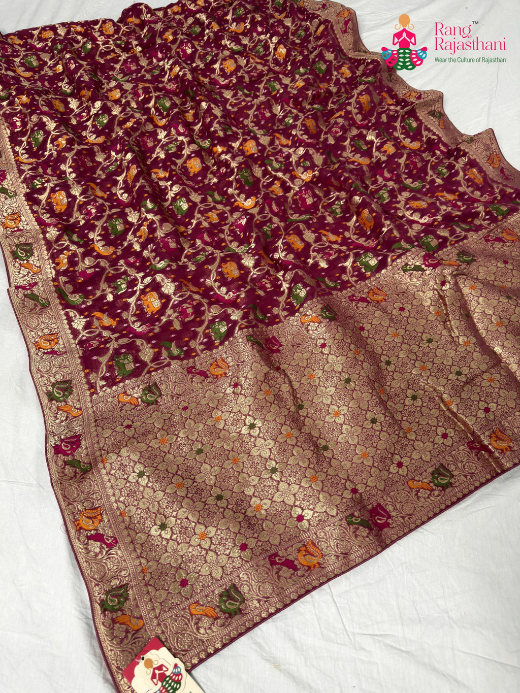 border detailing of gajari pure georgette khaddi saree