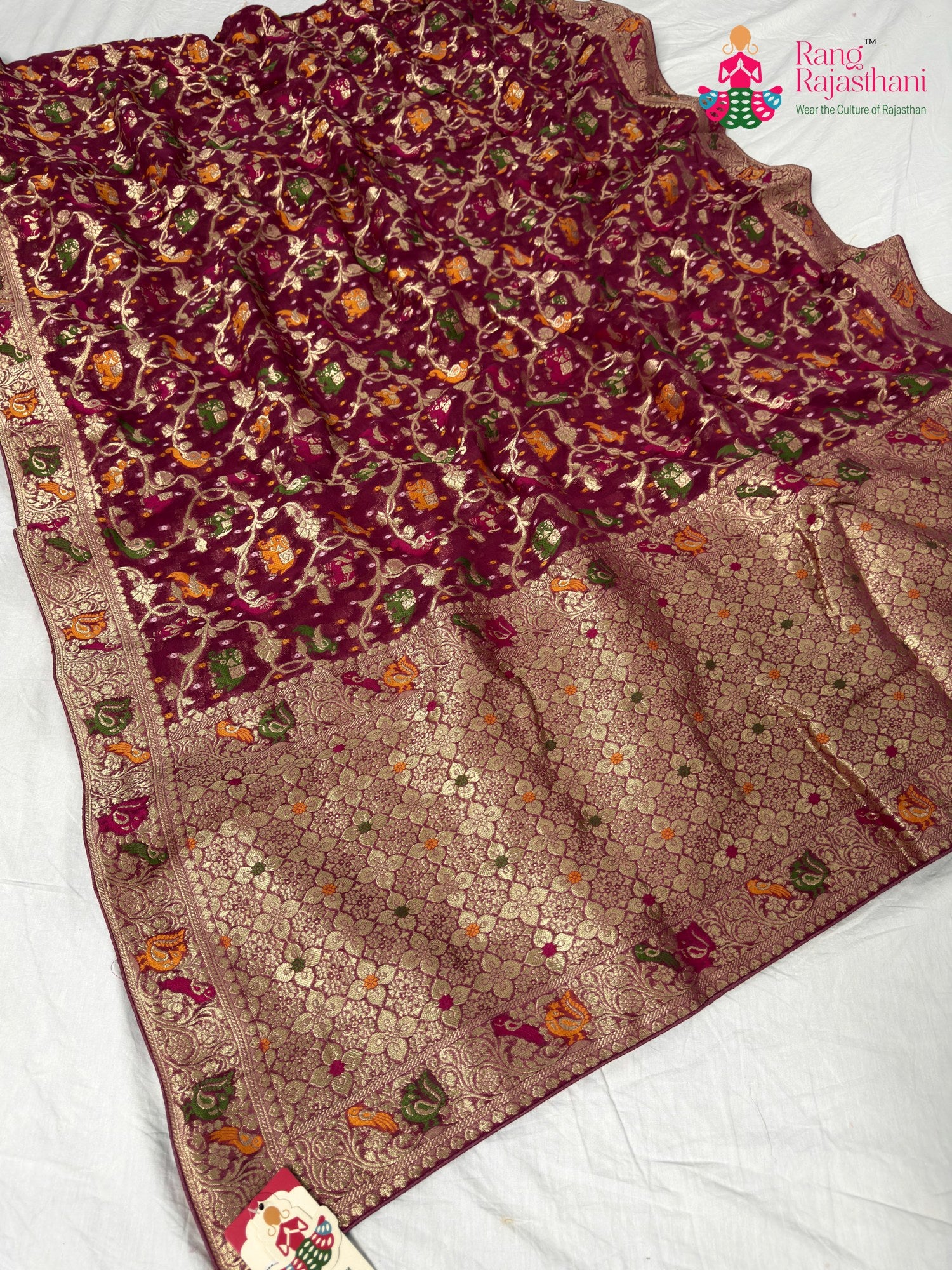 border detailing of gajari pure georgette khaddi saree