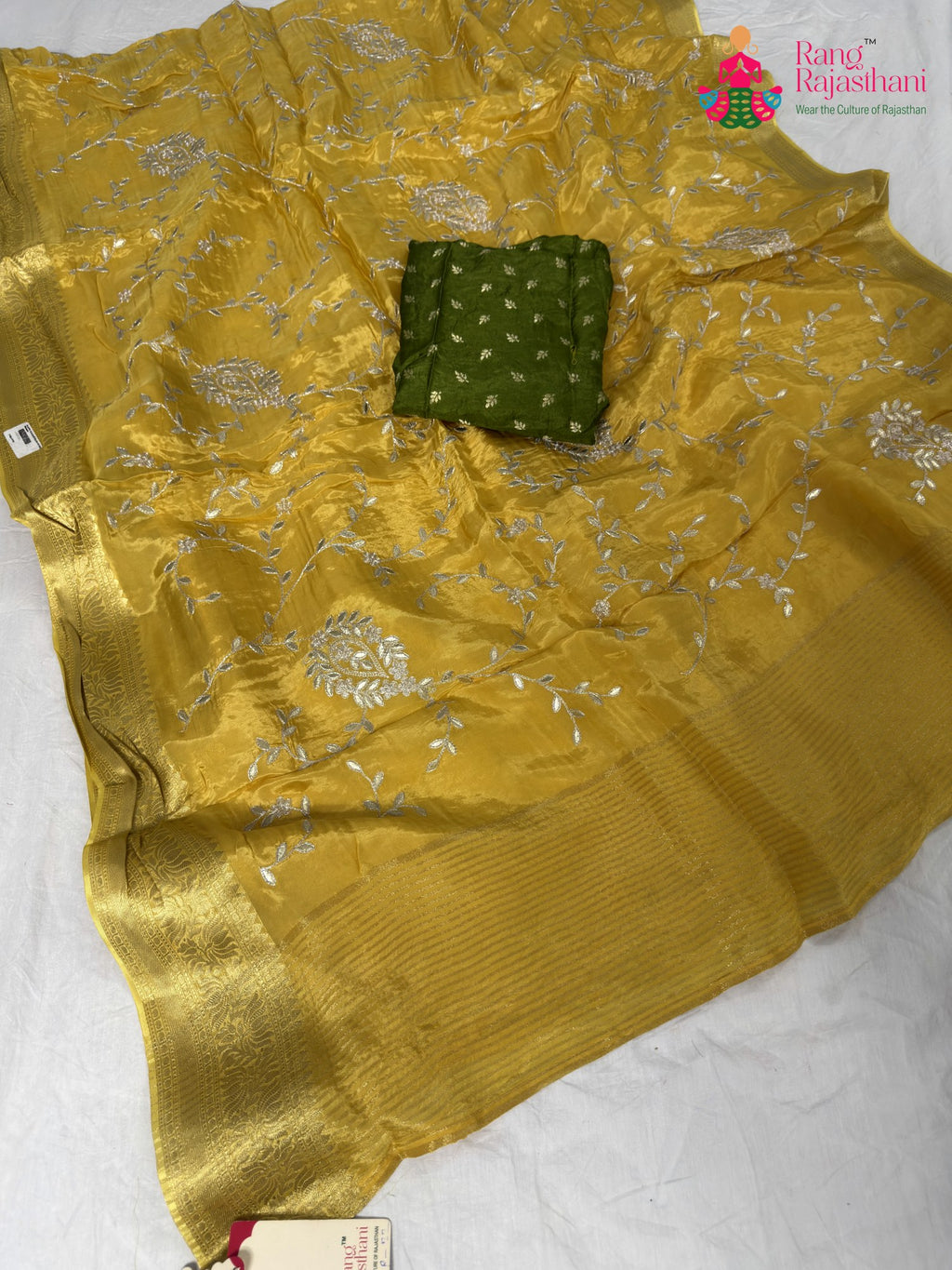 fabric texture of graceful yellow chinnon saree