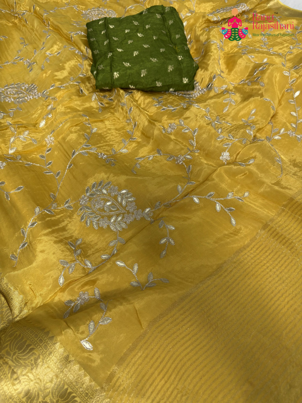 full view of graceful yellow chinnon saree
