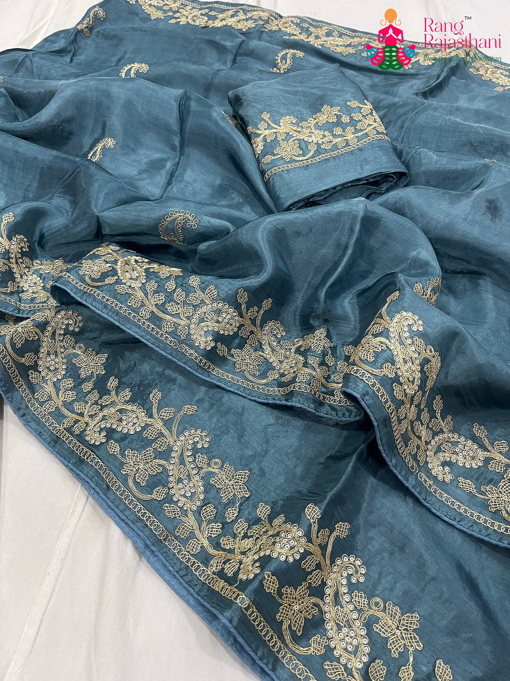 close up detailing of gray pure Russian silk resham embroidery saree 