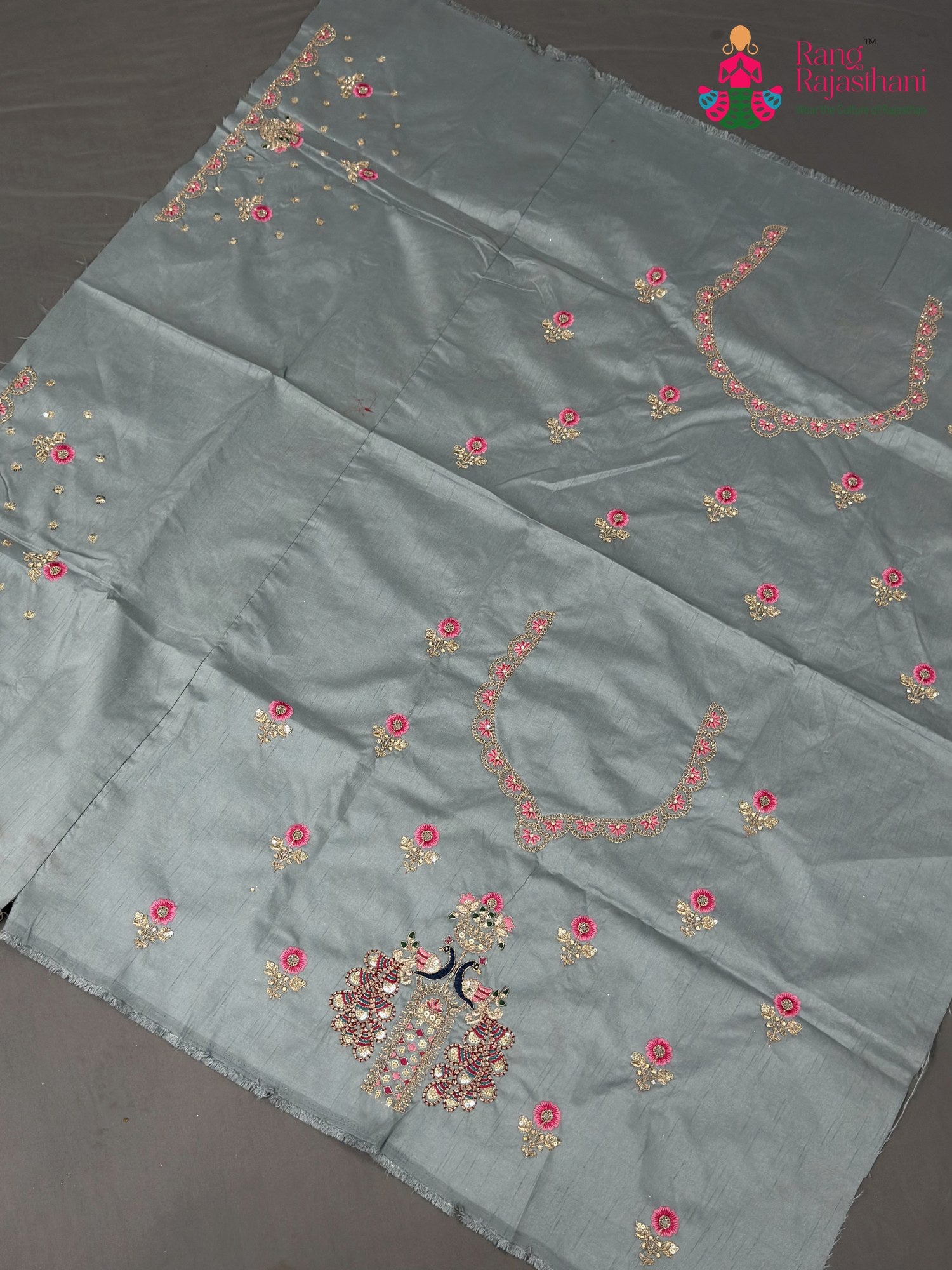 border detail of gray synthetic zari embroidery saree